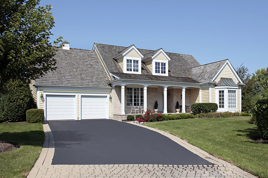 front-house-view-with-driveway-coating-sand-springs-ok